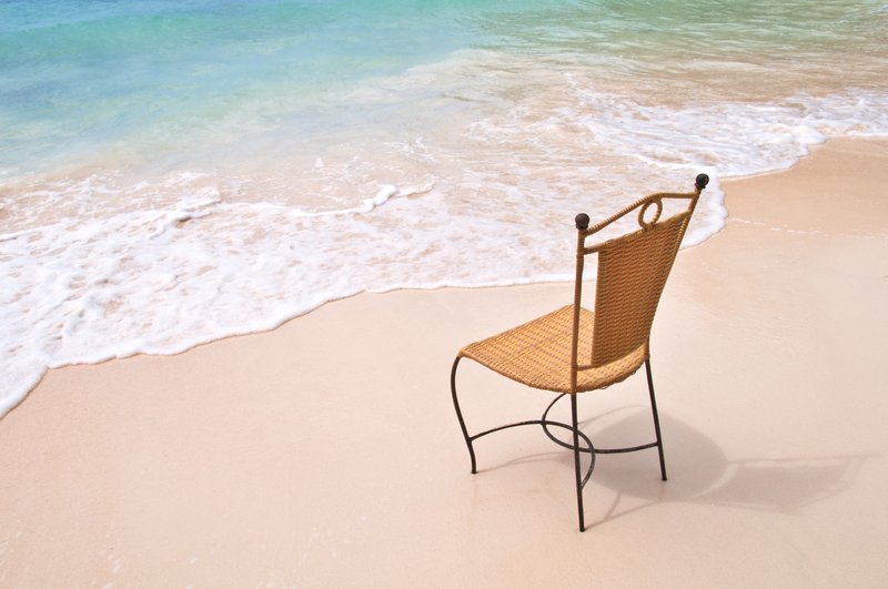 depression a lone chair on beach